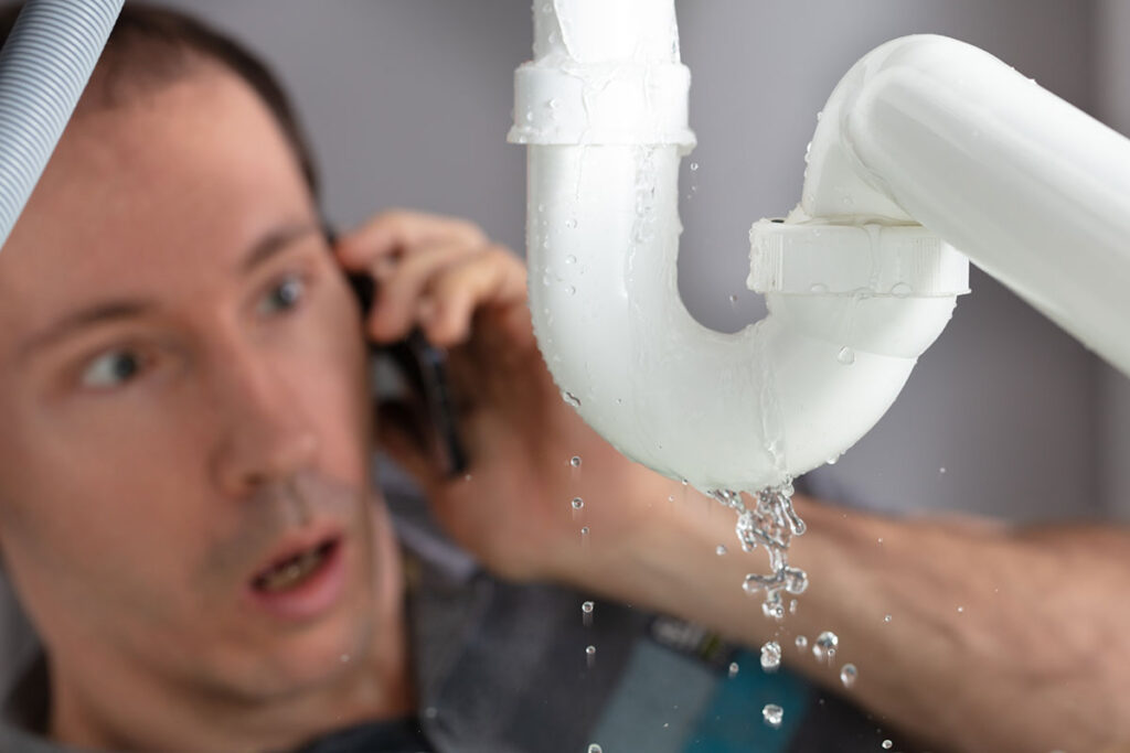 man calling plumber