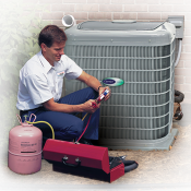 Tecnhician working on an outdoor A/C unit